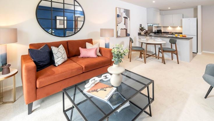 a living room with a couch and a coffee table