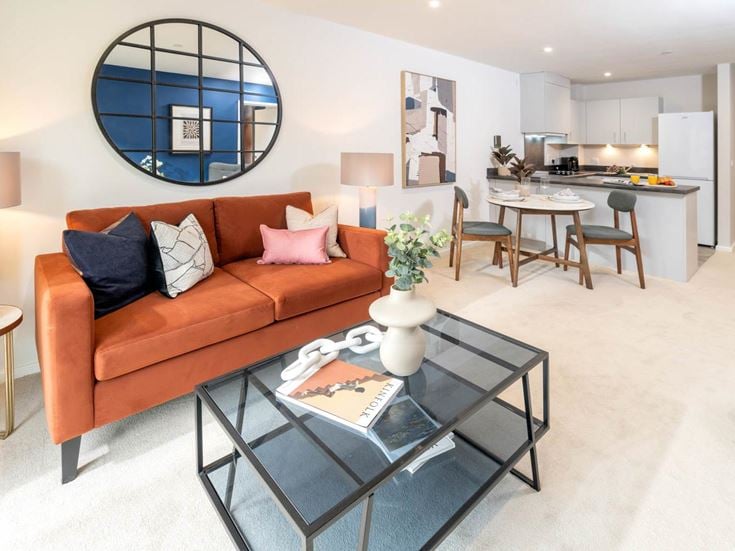 a living room with a couch and a coffee table