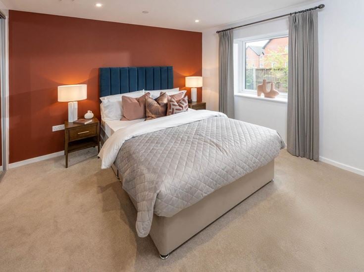 a bedroom with a large bed