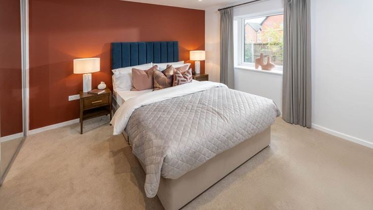 a bedroom with a large bed