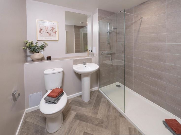 a bathroom with a glass shower