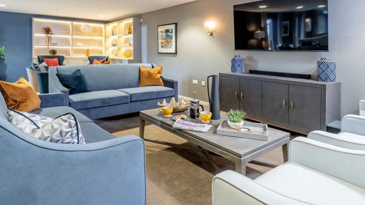 a living room with a couch and a coffee table