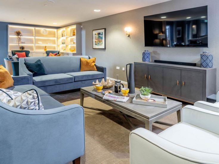 a living room with a couch and a coffee table