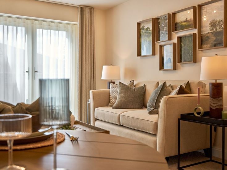 a living room with a couch and a coffee table