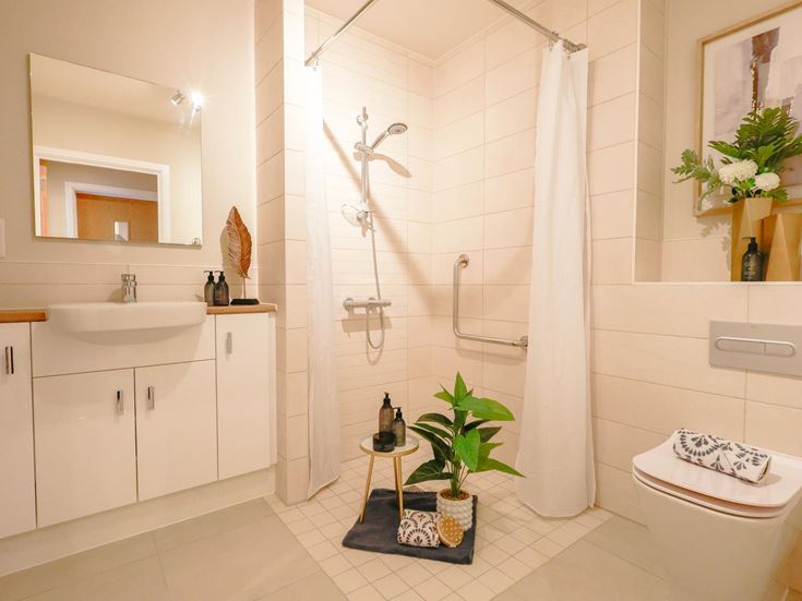 a bathroom with a standup shower