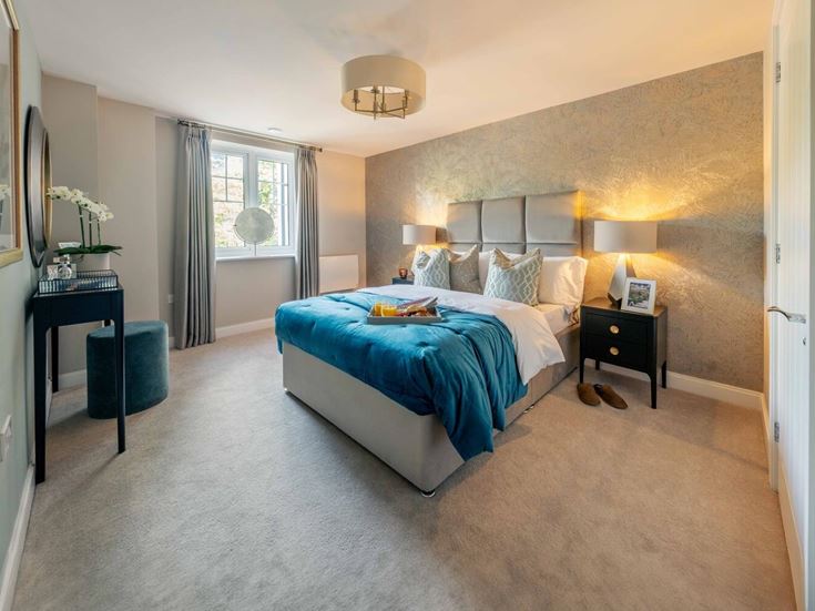 a bedroom with a large bed
