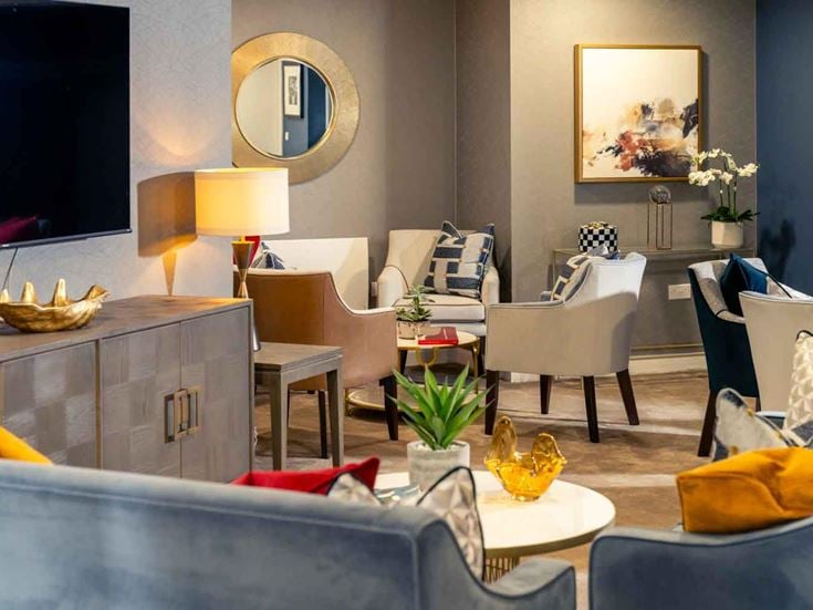 a living room with a couch and a coffee table