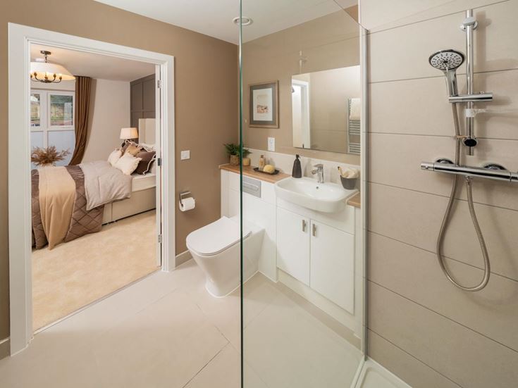 a bathroom with a shower and toilet