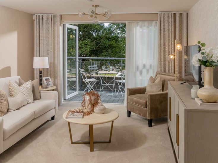 a living room with a large glass door