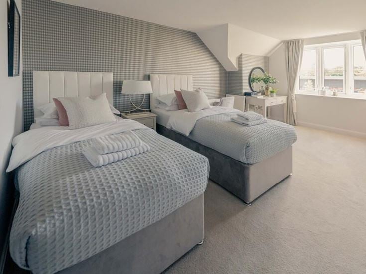 a room with two beds