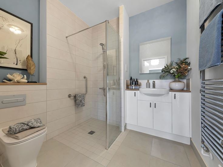 a bathroom with a glass shower
