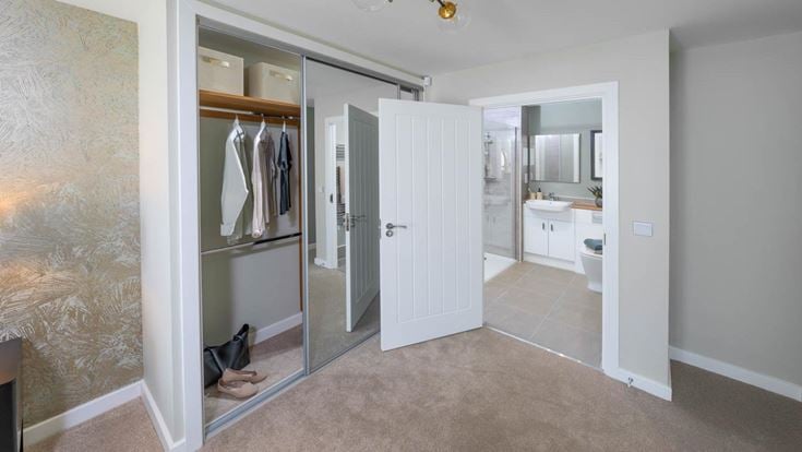 a bathroom with a glass door