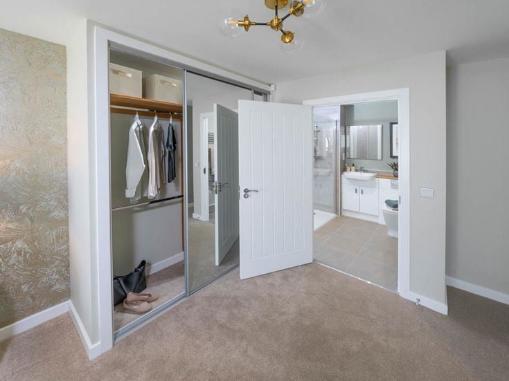 a bathroom with a glass door