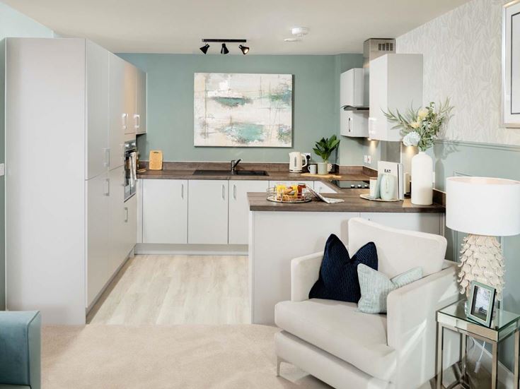 a living room with a white chair
