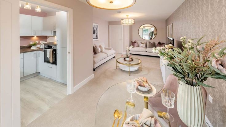 a living room with a dining table and couches