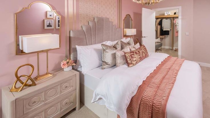 a bed with a large headboard