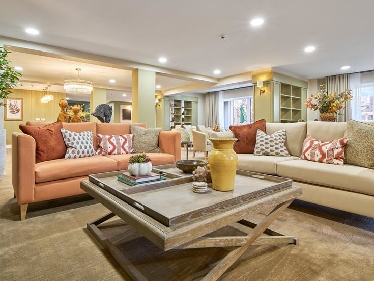 a living room with a couch and coffee table