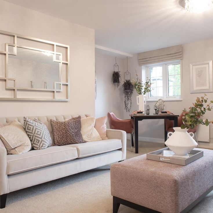 a living room with a couch and a coffee table