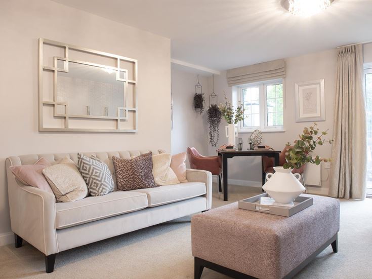 a living room with a couch and a coffee table