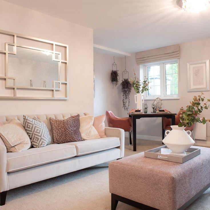 a living room with a couch and a coffee table