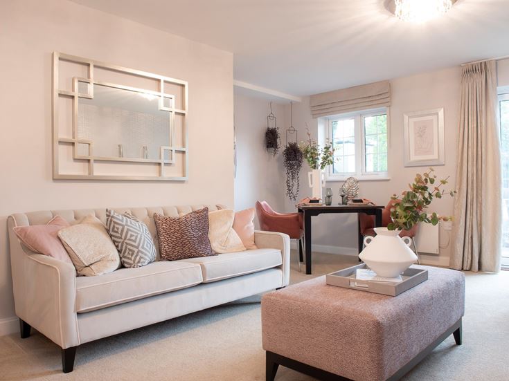 a living room with a couch and a coffee table