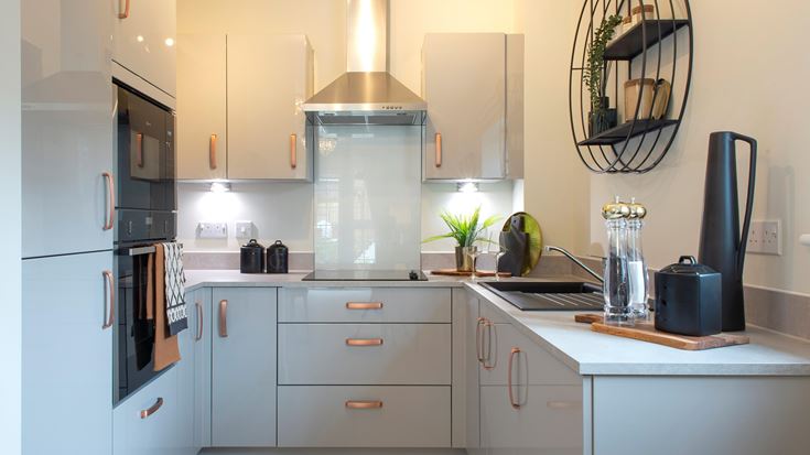 a kitchen with white cabinets