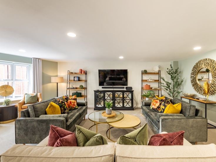 a living room with a large mirror