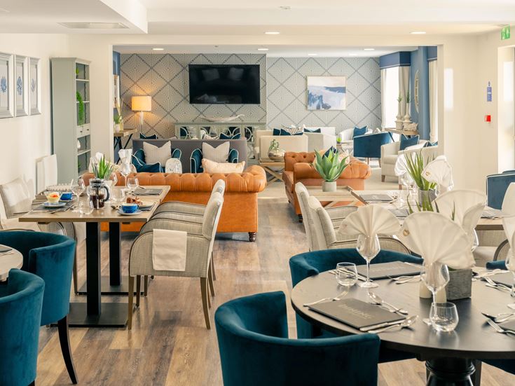 a room with tables and chairs