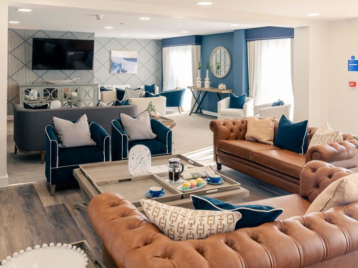 a living room with a couch and a coffee table
