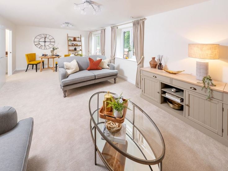 a living room with a couch and a coffee table