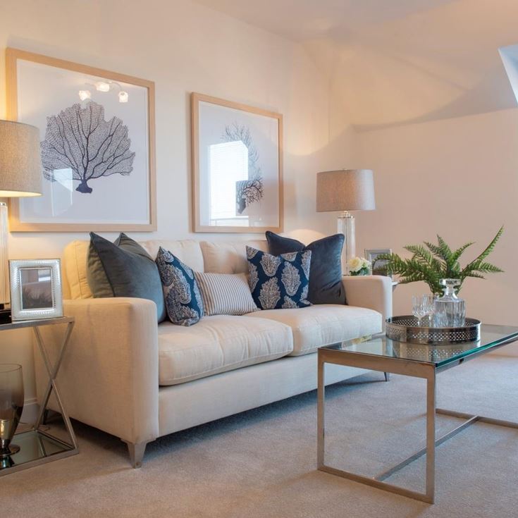 a living room with a couch and a coffee table