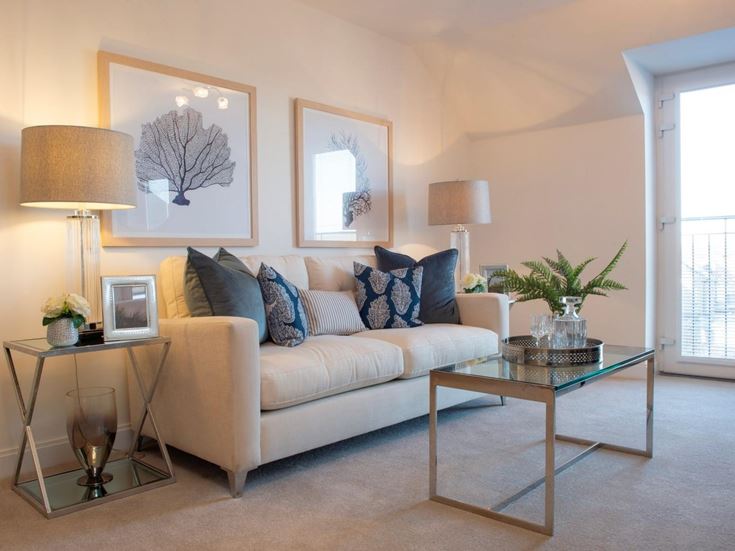 a living room with a couch and a coffee table