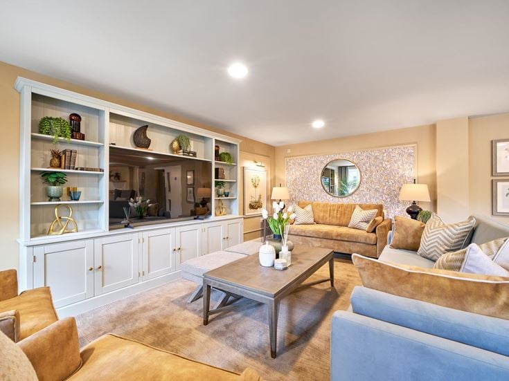 a living room with a large glass wall