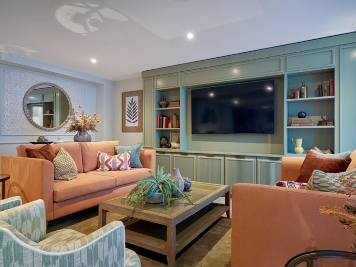 living room with multiple sofas