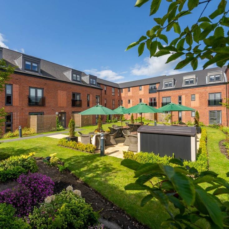 a garden in front of a building