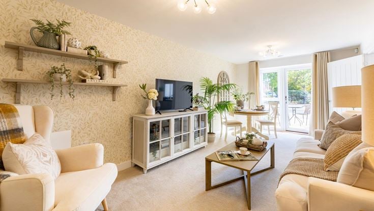 a living room with a large glass wall