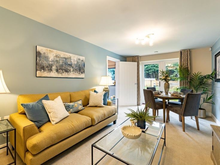 a living room with a couch and coffee table