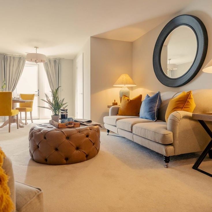 a living room with a large mirror