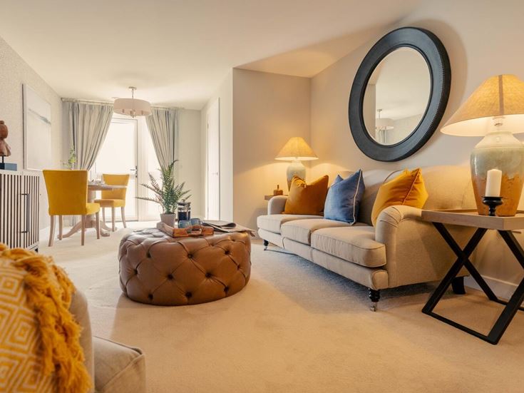 a living room with a large mirror