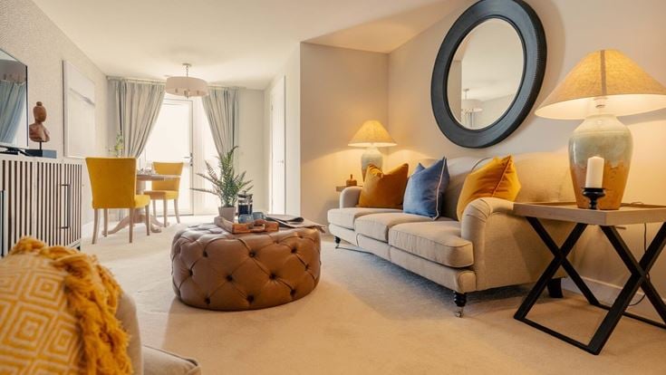 a living room with a large mirror