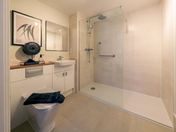 a bathroom with a glass shower