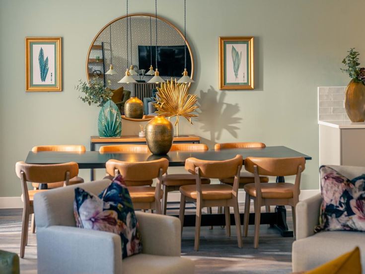 a dining room with a round table
