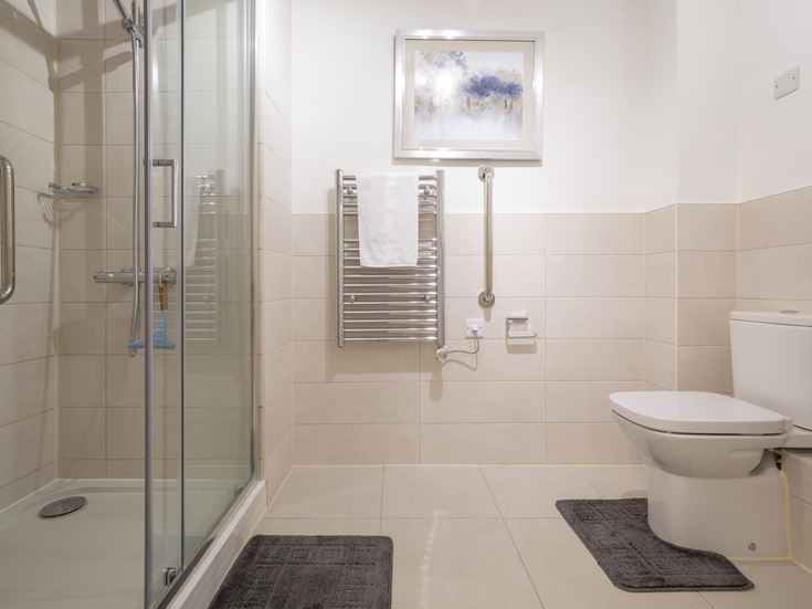 a bathroom with a glass shower