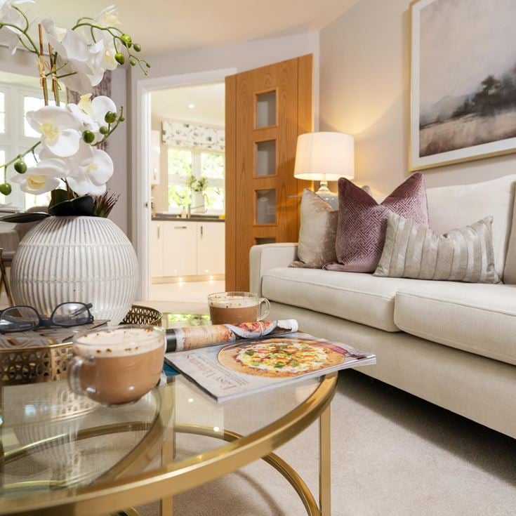 a living room with a couch and a coffee table