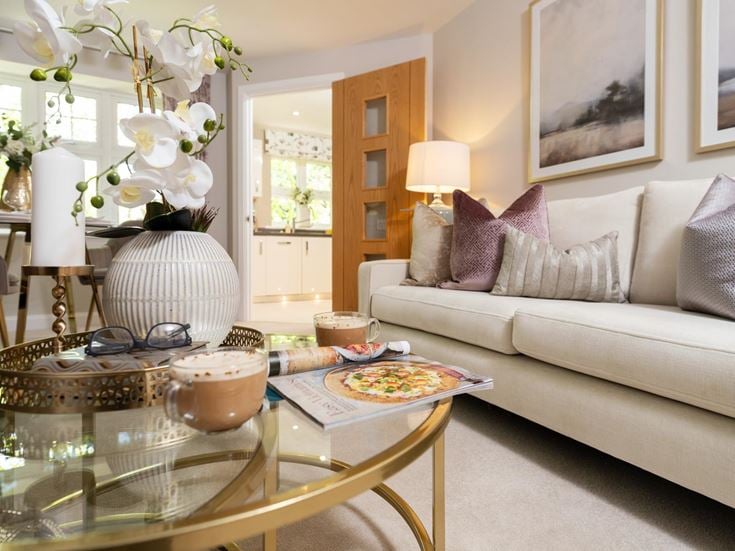 a living room with a couch and a coffee table
