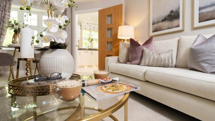 a living room with a couch and a coffee table
