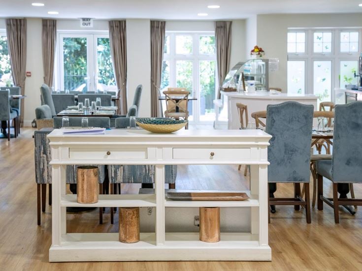 a room with a table and chairs