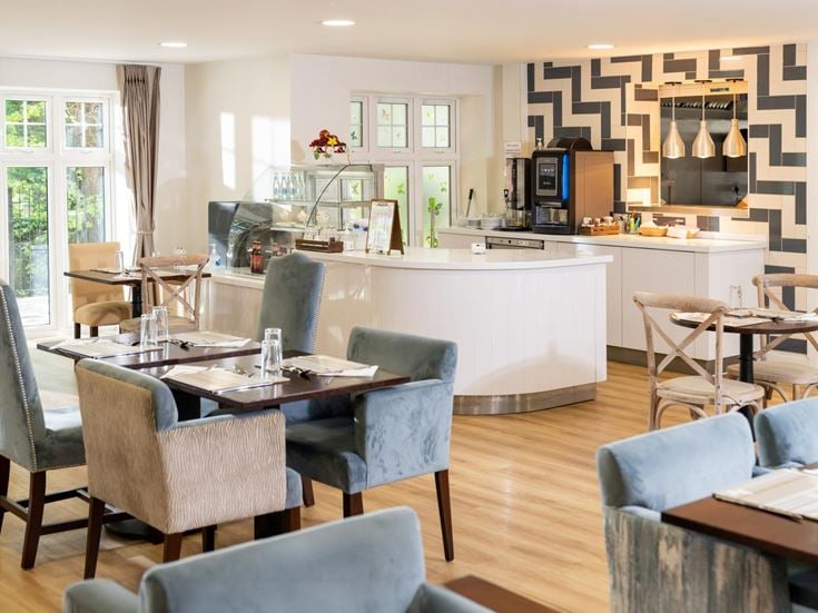 a large kitchen with a dining table