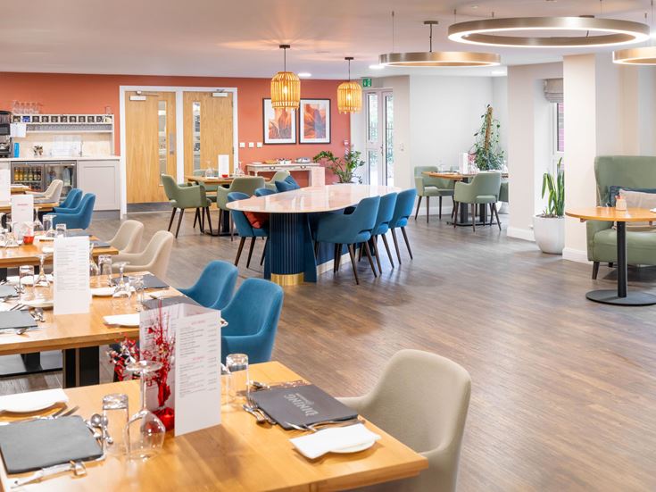 a room with tables and chairs