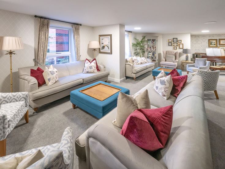 a living room with a couch and a table